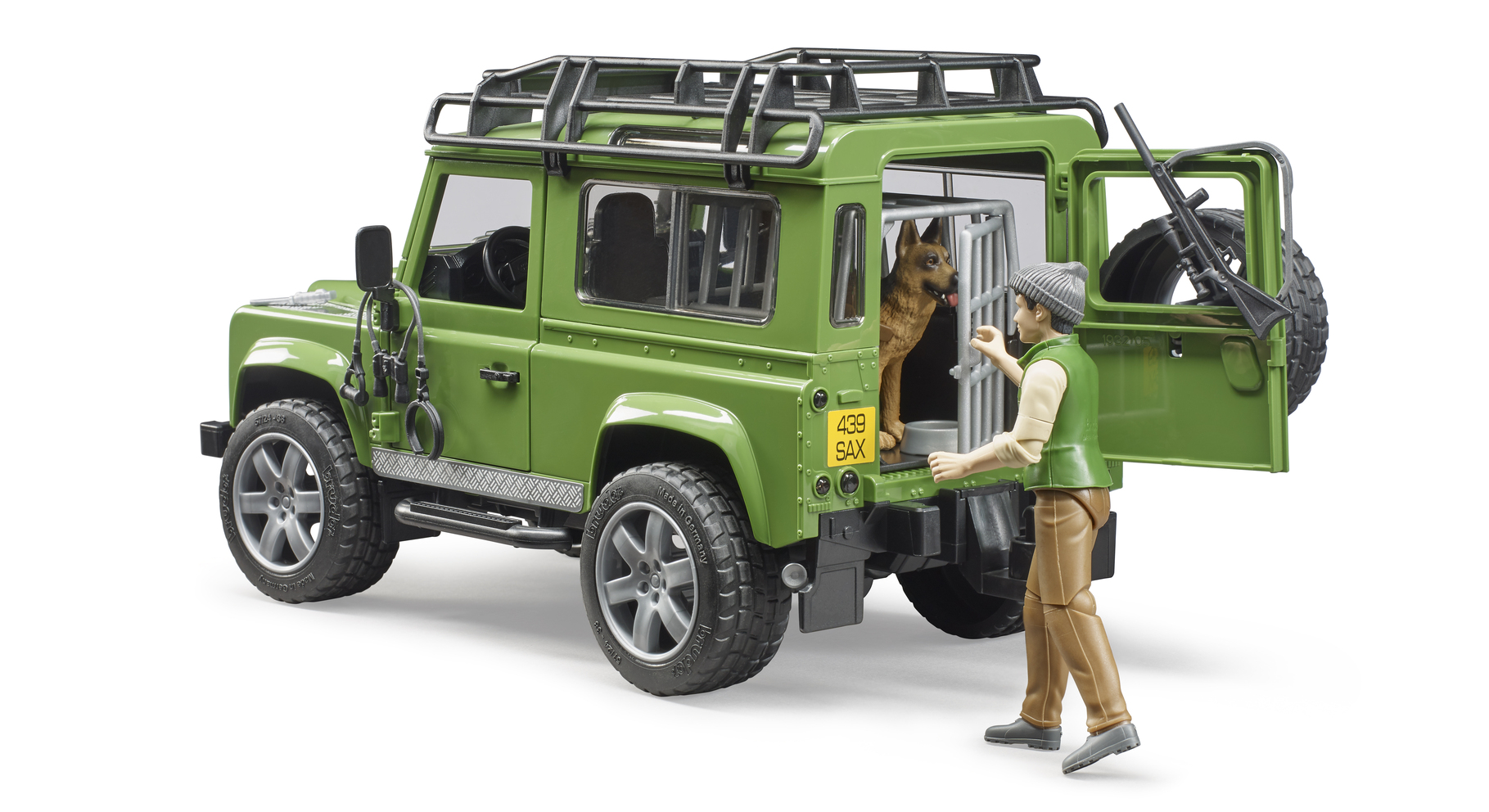 Внедорожник Land Rover Defender с фигуркой и собакой Bruder - фото 1